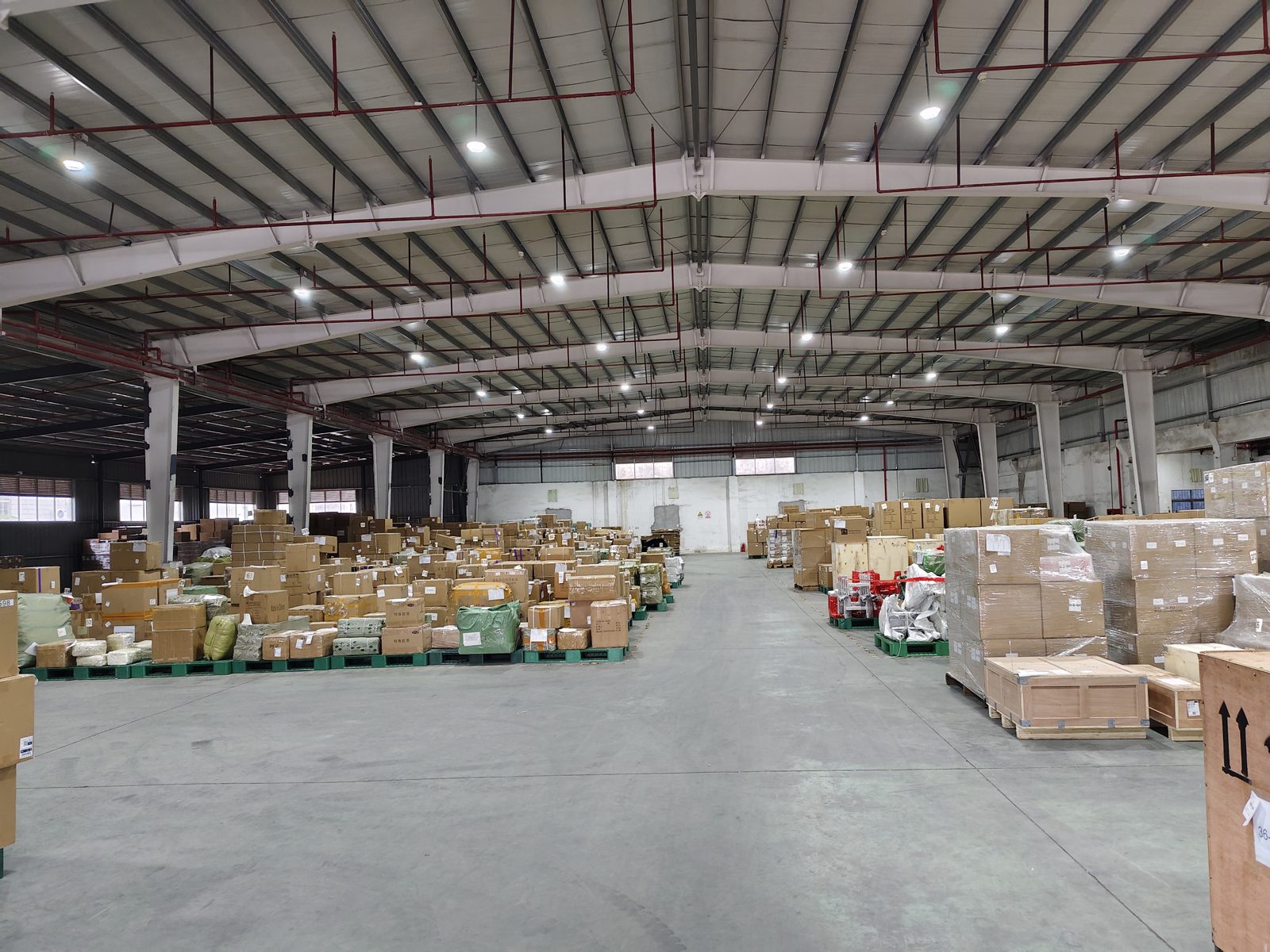 WHEATLAND CARGO LIMITED warehouse area with commercial cargo and packed shipments